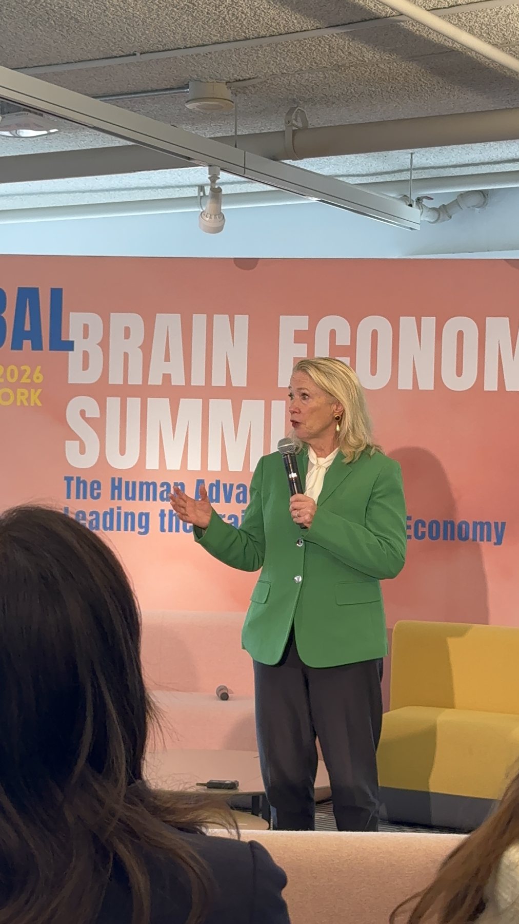 Prof. Gail Russeaue onstage at the Global Brain Economy Summit